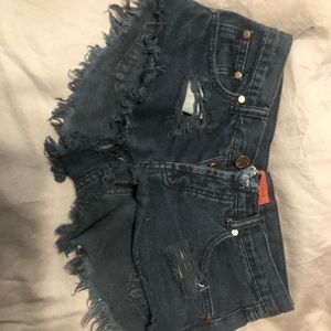 Black ripped shorts